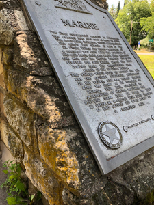 Mill stone marker plaque detail